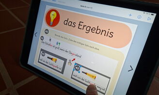 Auf einem iPad ist Bild mit einem Ergebnis von einem Experiment über Licht und Schatten zu sehen